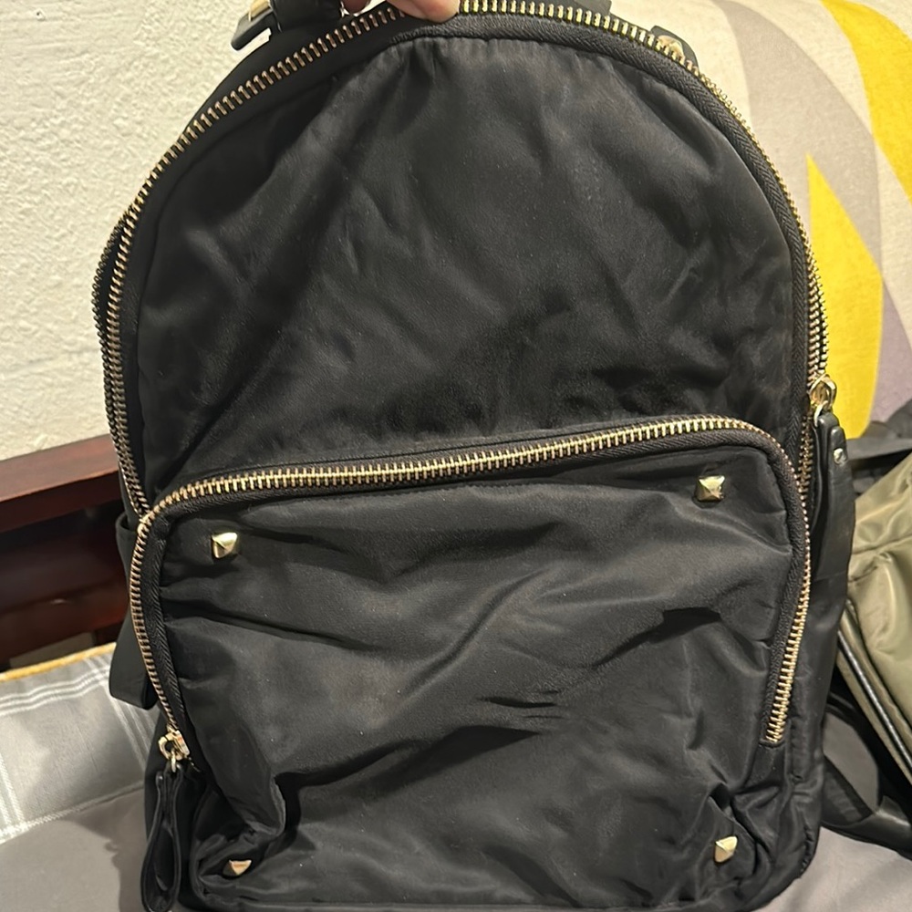 Black Backpack with Gold Accents